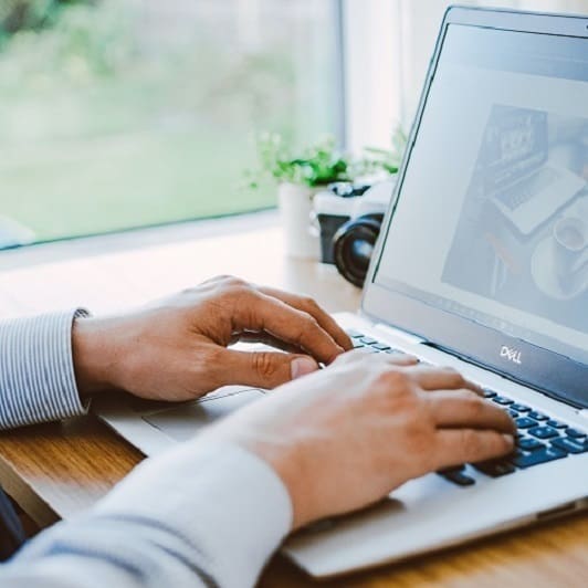 Image of employee opening internet downloads in a laptop browser at Centurion Computers IT Support in Hexham